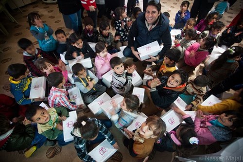 Suhail-Al Nouri from The First Group with Happy Box recipients